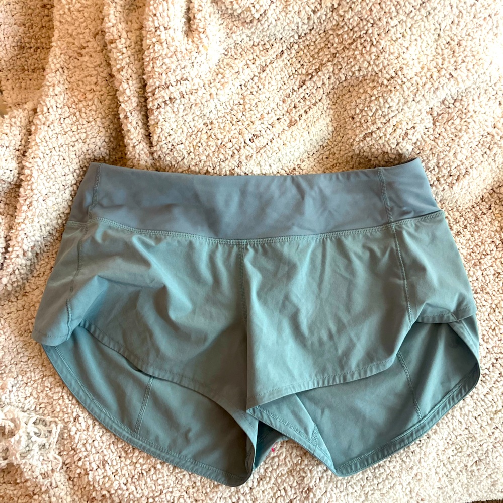 Teal lululemon speed up shorts size 4